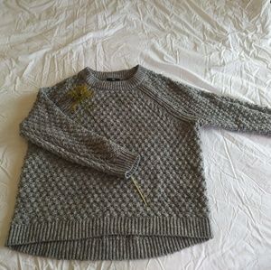 A cozy light grey sweater